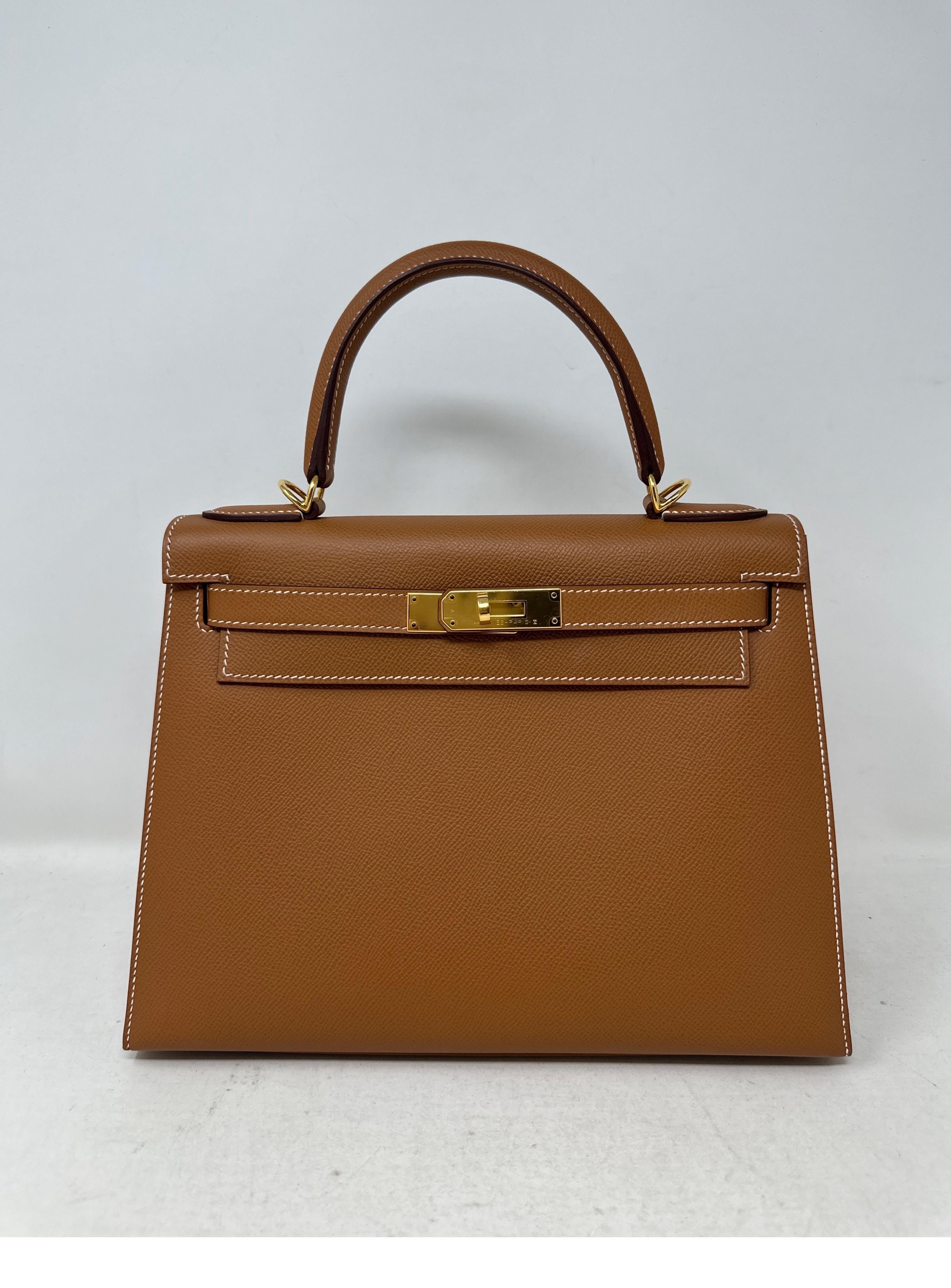 Hermes Gold Kelly 28 Bag. Sellier epsom leather. Beautiful gold tan color. Most wanted combination. Gold on gold. Like new condition. Never used. Includes clochette, lock, keys, and dust bag. Guaranteed authentic. 