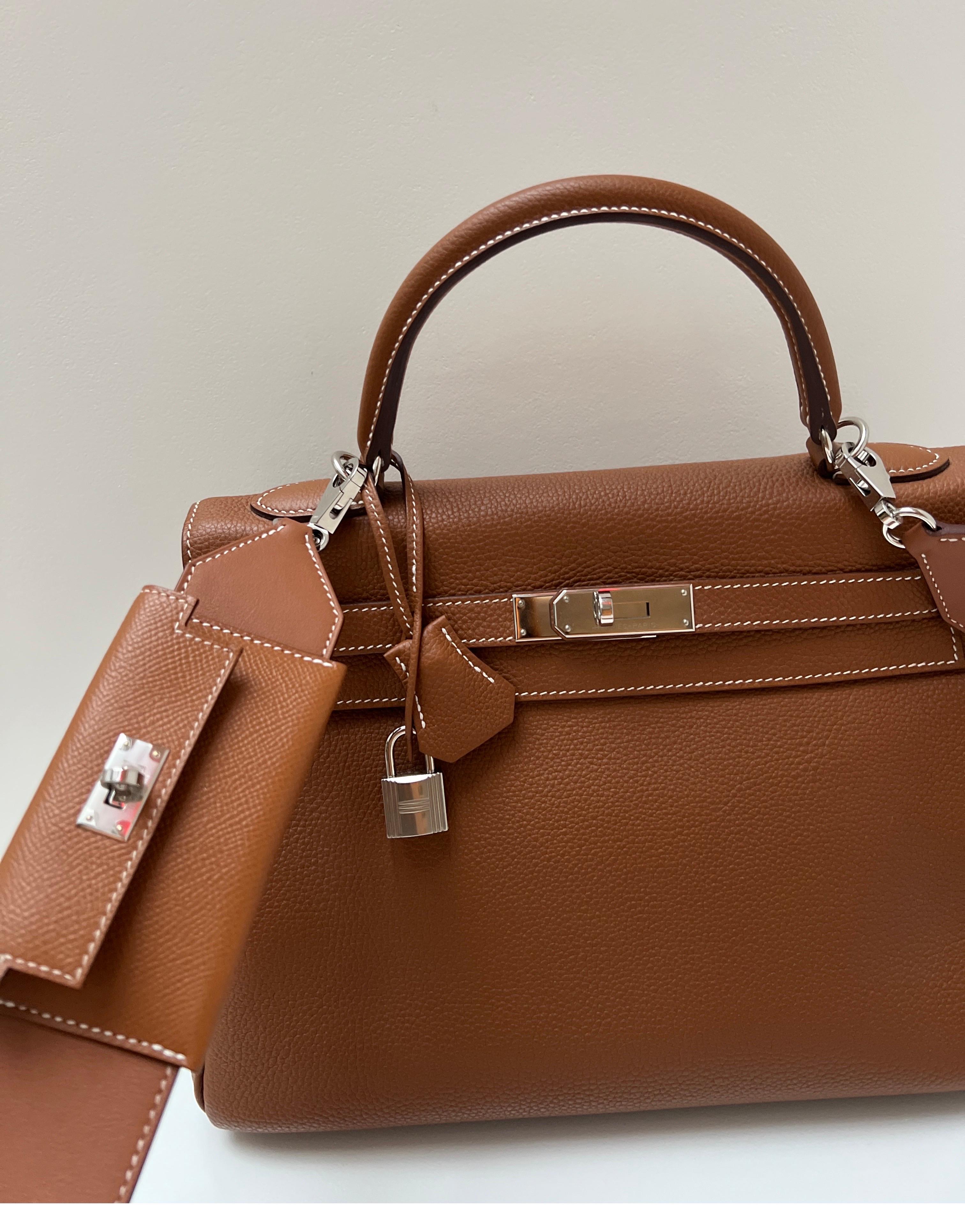Hermes Gold Kelly 28 Bag. Includes rare Hermes pocket strap. Kelly is newer only a few years old. Looks like new. Gold tan color in togo leather. Palladium silver hardware. The bag is iconic and most wanted. Great neutral tan color. Interior is