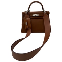 Borsa Kelly 32 in oro di Hermes