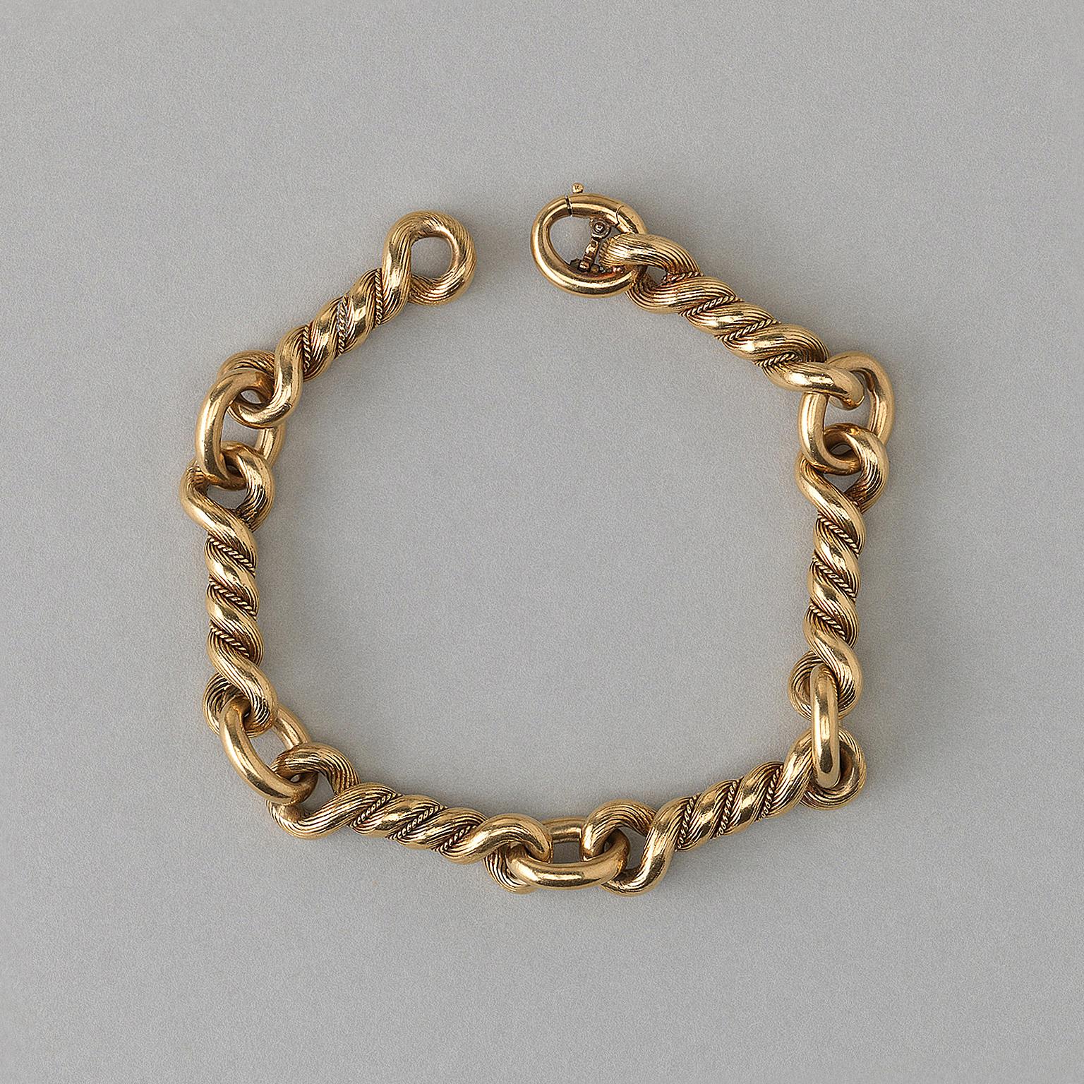 An 18 carat gold knot bracelet, signed: Hermès, Paris, circa 1970.

weight: 71.9 grams
length: 21 cm