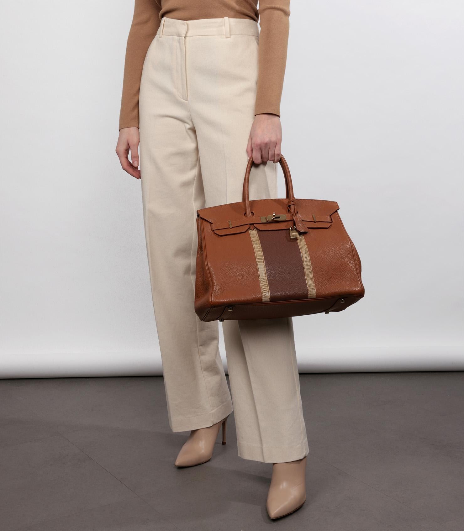 Hermès Gold, Marron D'Inde Clemence Leather & Ficelle Lizard Leather Club Birkin 35cm Retourne

Brand- Hermès
Model- Birkin 35cm
Product Type- Tote
Serial Number- [P*
Age- Circa 2012
Accompanied By- Hermès Dust Bag, Padlock, Keys, Clochette, Small
