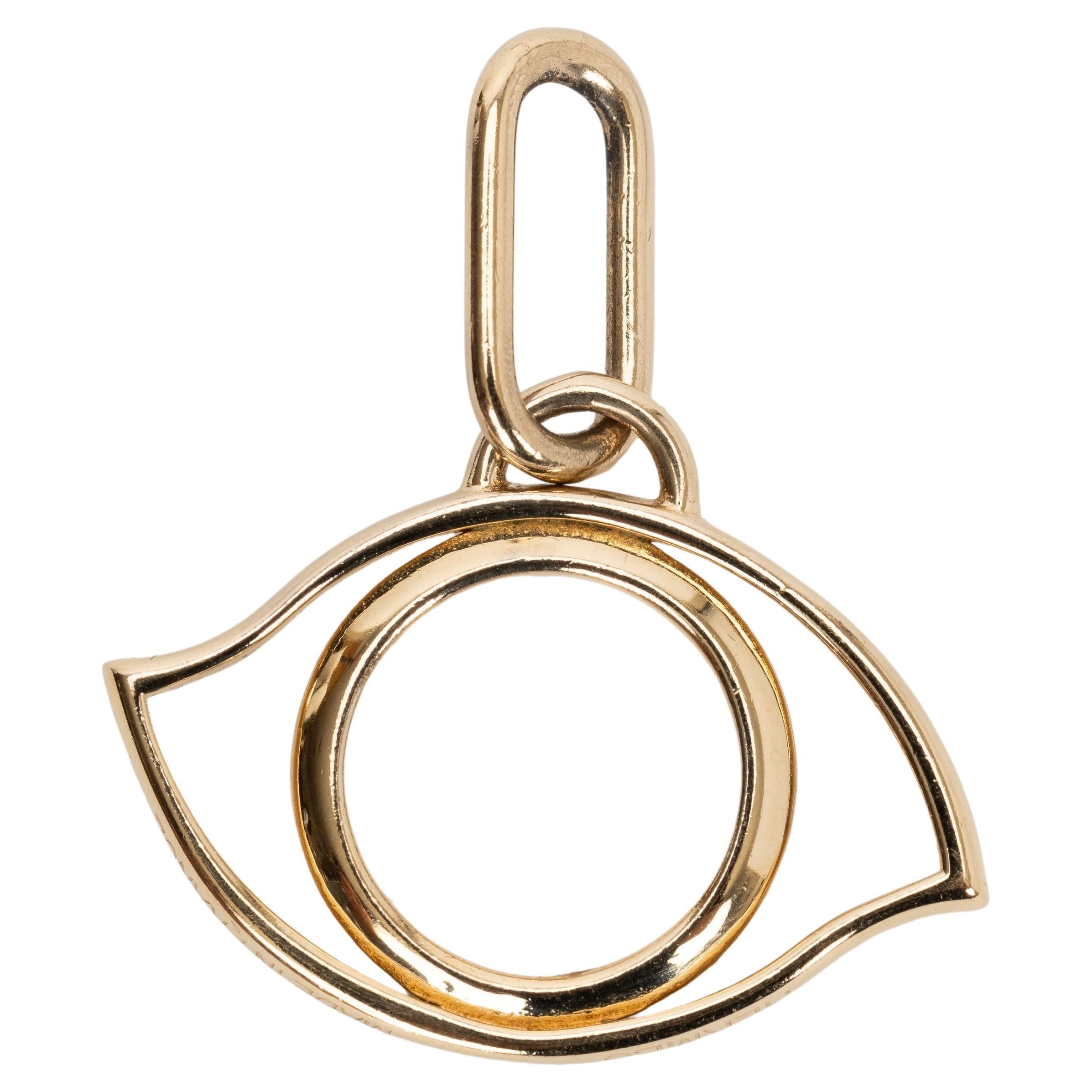Hermes Gold Oeil Curiosite Eye Charm en vente