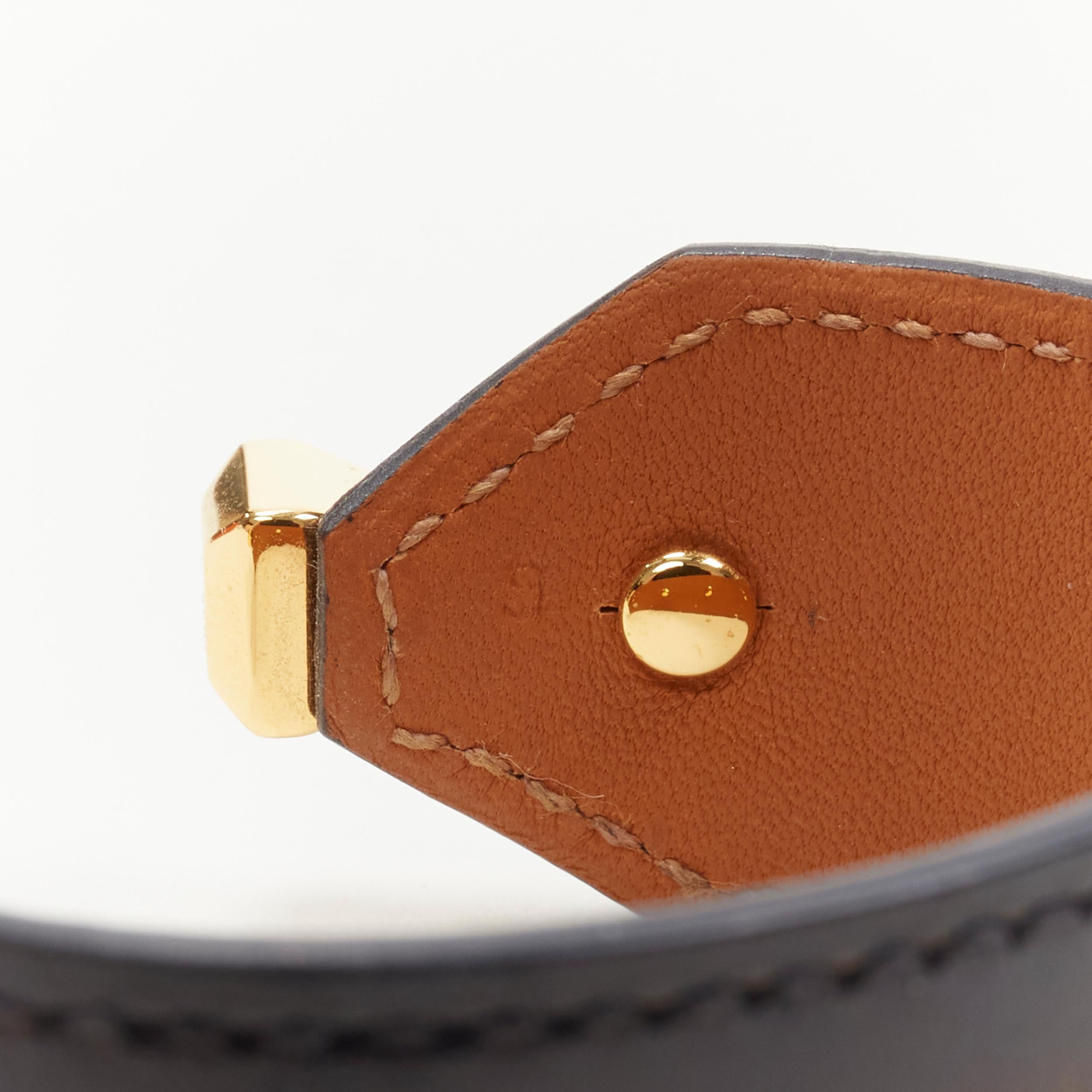 Women's HERMES gold plated brass black leather open cuff minimal bracelet For Sale