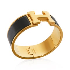 Bracelet « Clic Clac » Hermès plaqué or, modèle « Noir »