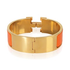 Hermès Gold-Plated  Clic Clac In Orange Fruite Bracelet