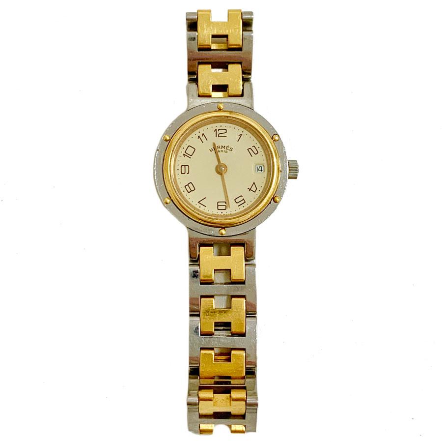 Very nice watch from Maison HERMES, small model Clipper, palladium steel and gold plated. This watch has a quartz movement. The case is round and steel. The screwed bezel is gold plated.
On this model the dial is beige, the hands are gold plated. A