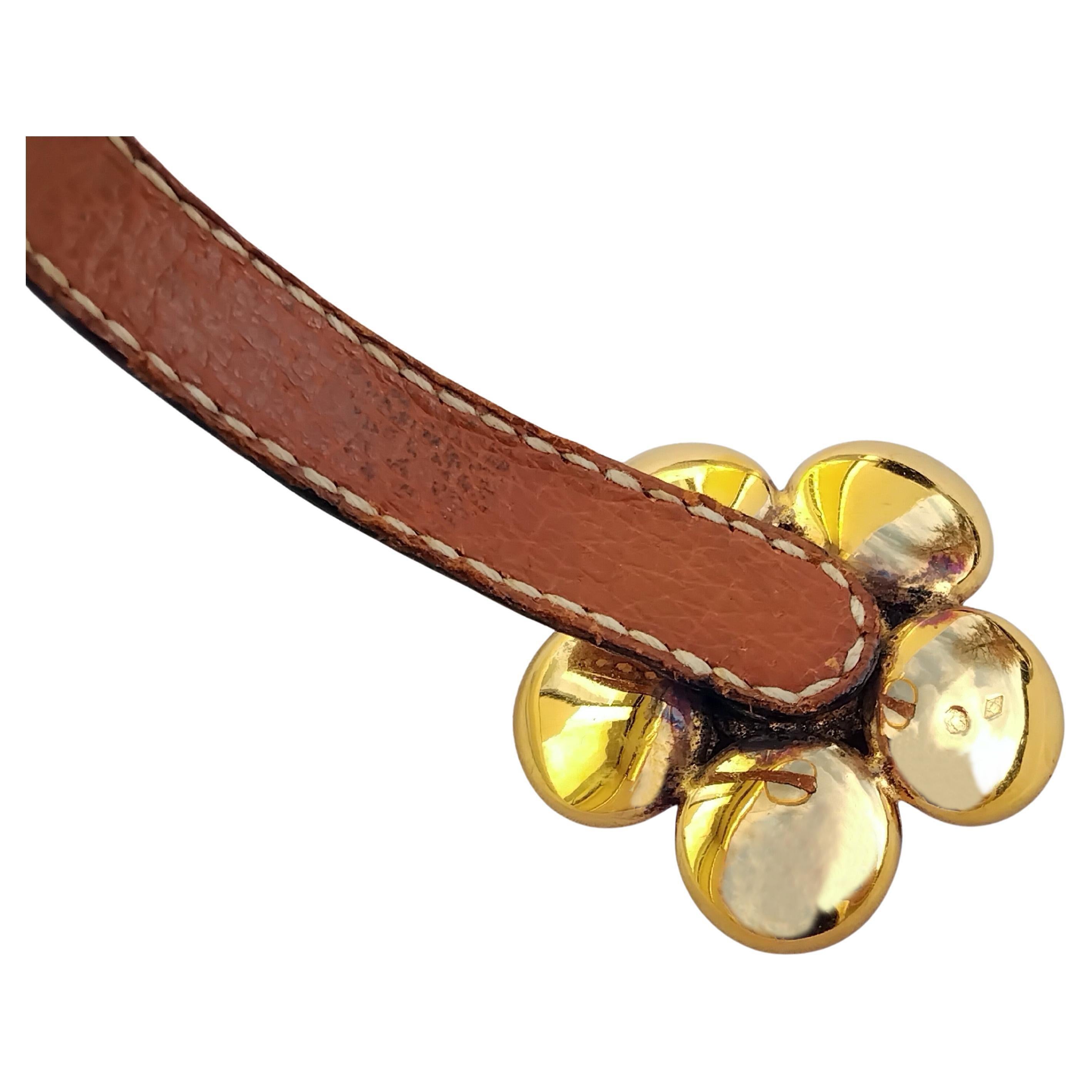 Hermès Pulsera de cuero dorado FLORA en Bastante bueno estado para la venta en Corcoué Sur Logne, Loire-Atlantique