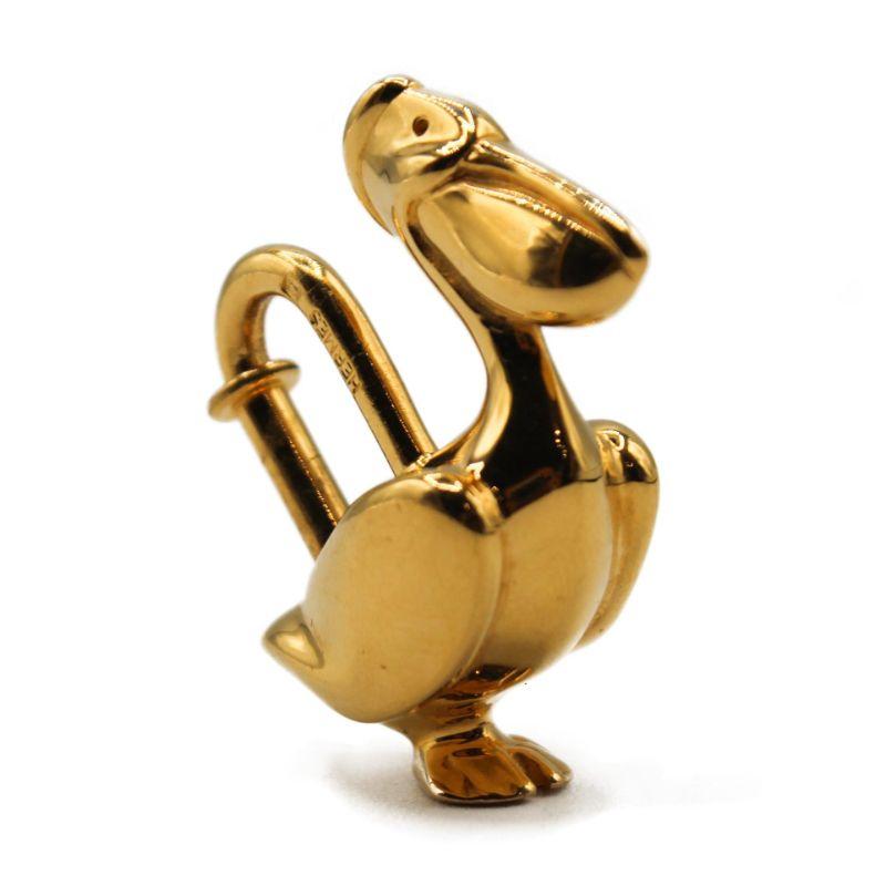 Hermes gold plated pelican charm

Really good condition, light signs of use
Packaging:  Opulence Vintage box

Additional information:
Designer: Hermes
