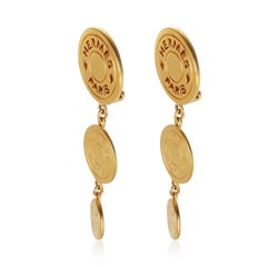Boucles d'oreilles pendantes vintage « Clou de Selle » plaquées or, Hermès