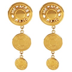 Boucles d'oreilles pendantes vintage « Clou de Selle » plaquées or, Hermès