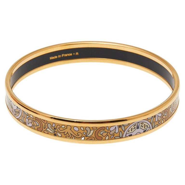 Hermès Gold Printed Enamel Gold Plated Bangle Bracelet at 1stDibs