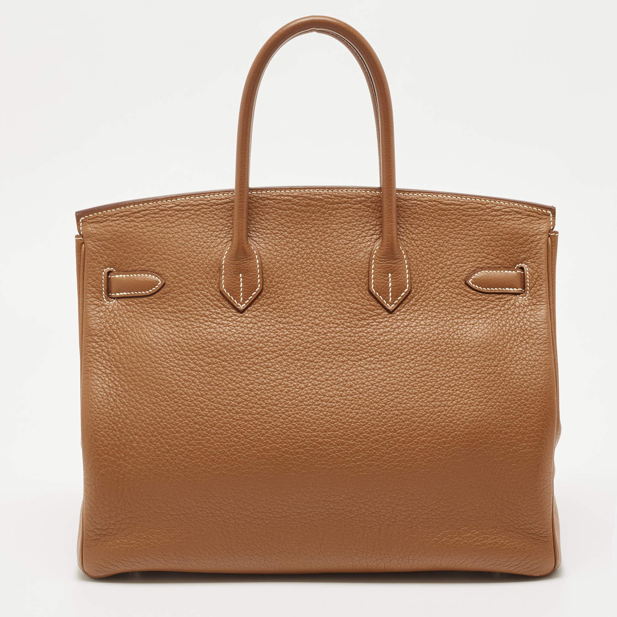 Handcrafted from the highest quality leather by skilled artisans, it takes long hours of rigorous effort to stitch a Birkin together. Crafted in France from Taurillion Clemence leather, this Birkin 35 features dual top rolled handles and