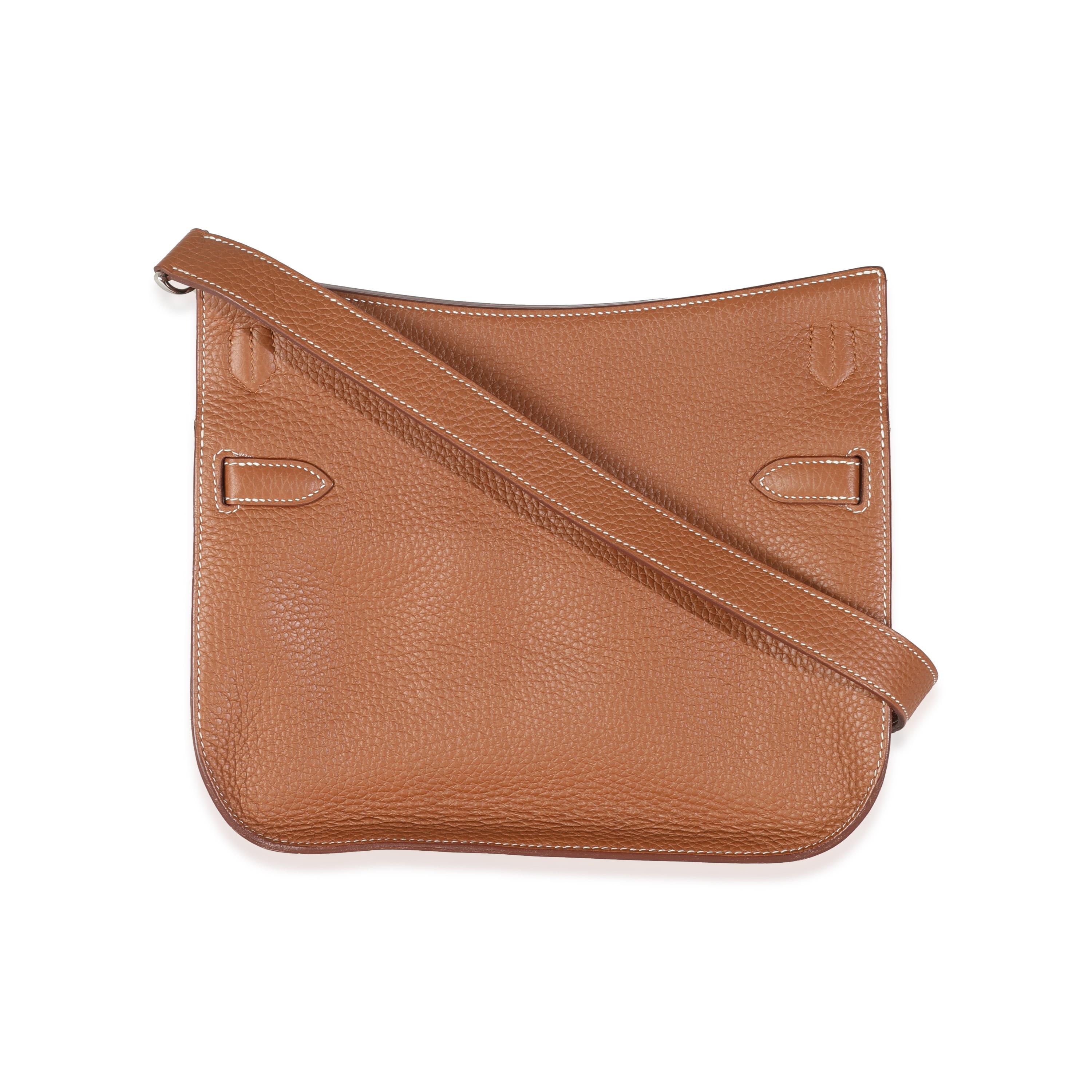 Listing Title: Hermès Gold Taurillon Clemence Jypsiere 28 PHW
SKU: Z144550
Condition: Pre-owned 
Handbag Condition: Excellent
Condition Comments: Item is in excellent condition and displays light signs of wear. Light scratching along hardware. Faint