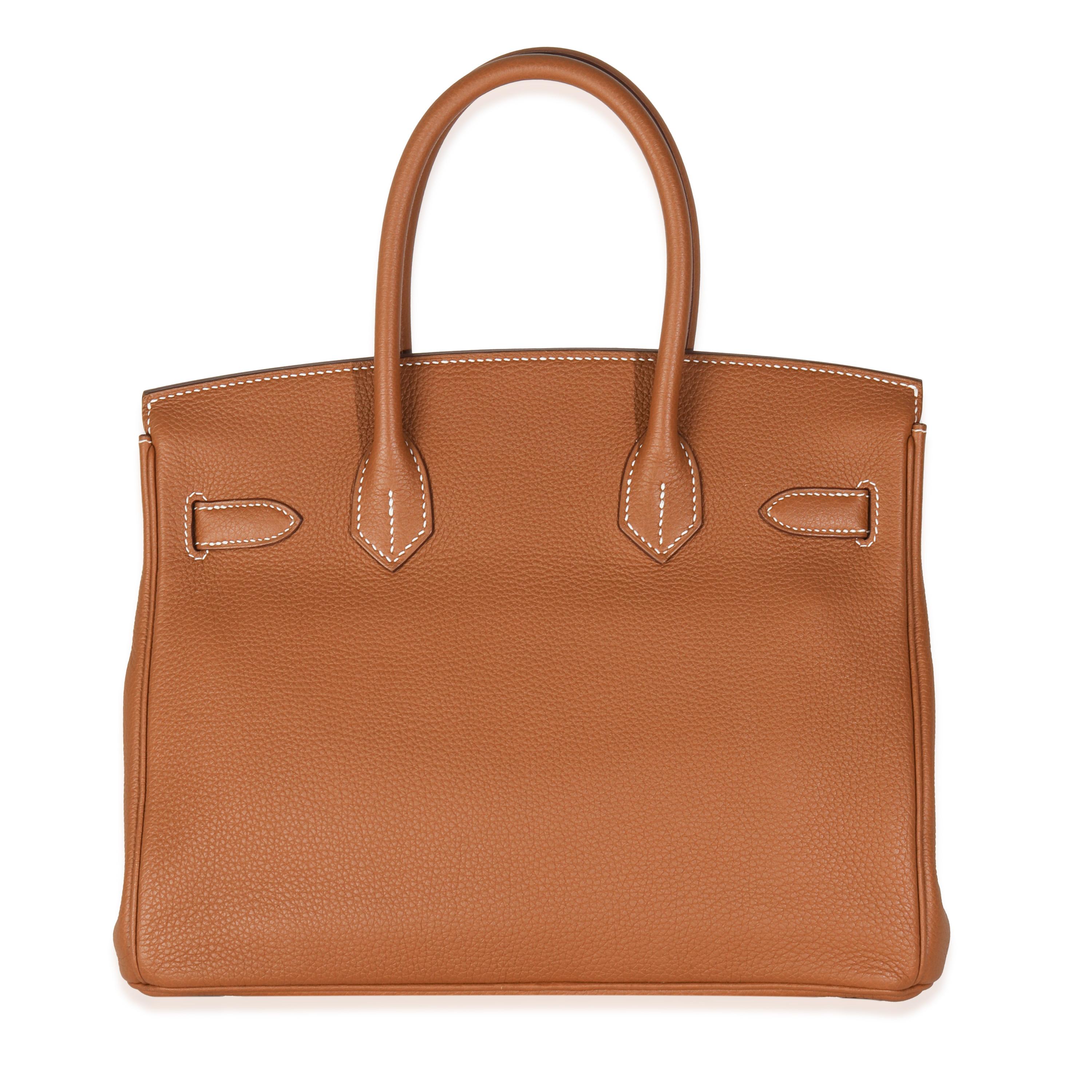Listing Title: Hermès Gold Togo Birkin 30 PHW
SKU: M149198
Condition: Pre-owned 
Condition Description: The elusive Birkin bag from Hermès was designed after then-artistic director, Jean-Louis Dumas, was sat next to Jane Birkin on a flight from
