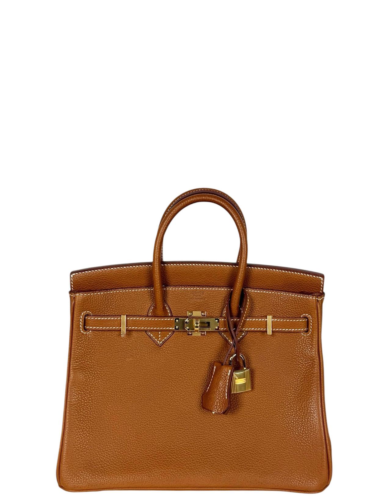 Hermes Gold Togo Leather 25cm Birkin Bag w/ Gold Hardware

Made In: France
Year of Production: 2019
Color: Gold- tan
Hardware: Goldtone
Materials: Togo leather
Lining: Chevre leather
Closure/Opening: Flap top with two draw strap closures and