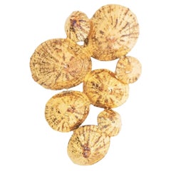 Hermes Gold Tone Shell Brooch