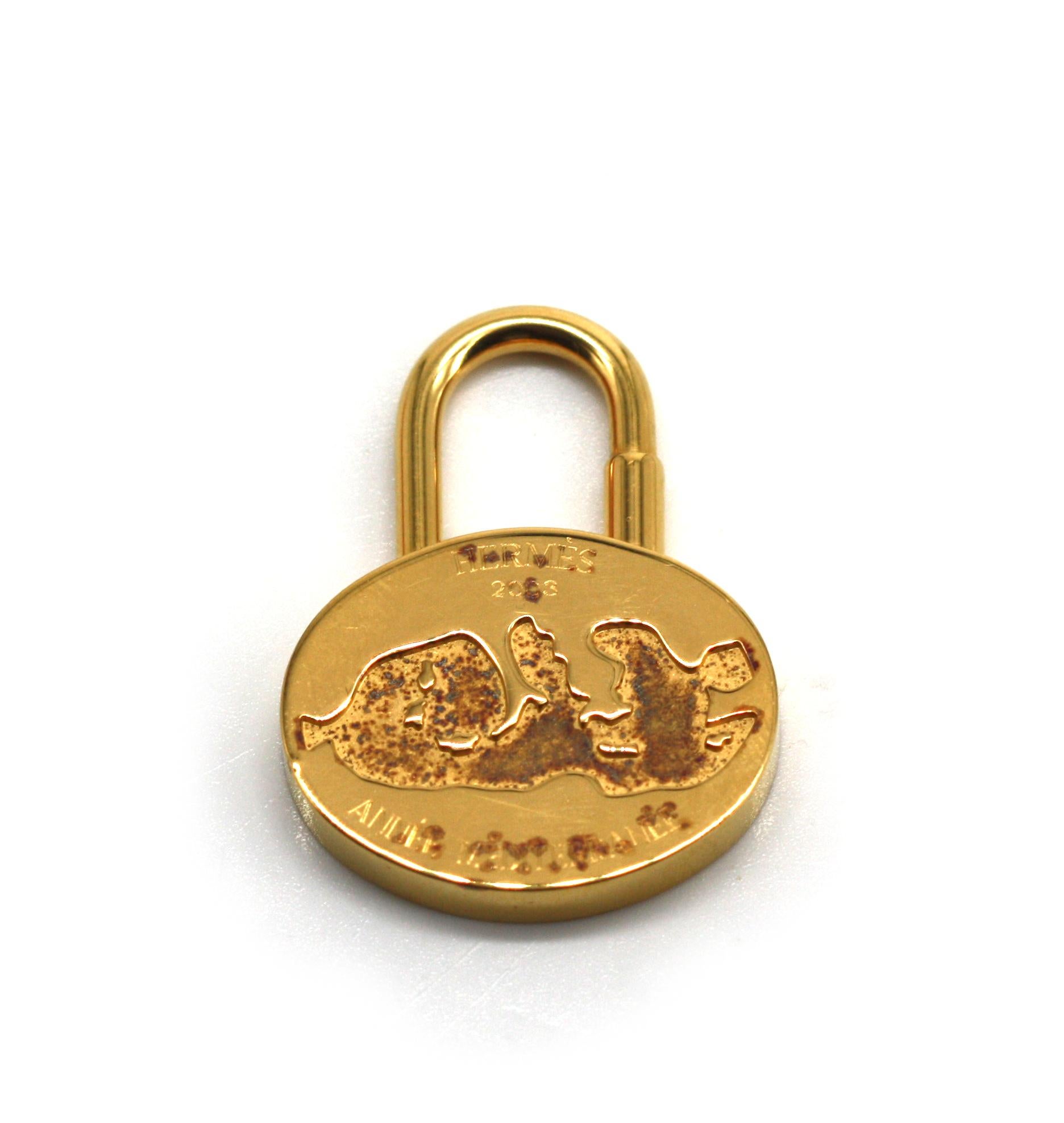Hermes Gold Toned Annee Mediterranee Bag Charm, 2003
Height 1.75 in., Width 1.25 in.
Condition Report
Good condition.