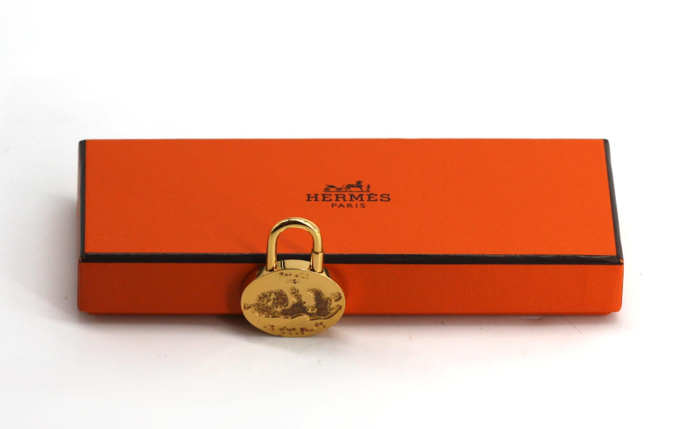Hermes Gold Toned Annee Mediterranee Bag Charm, 2003 In Good Condition For Sale In West Palm Beach, FL