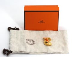 Hermes Goldfarben getönter Pelikan-Taschenanhänger, 1992