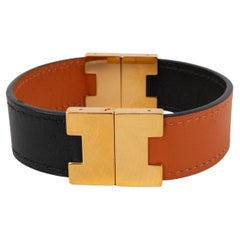 Bracciale Hermès in metallo dorato