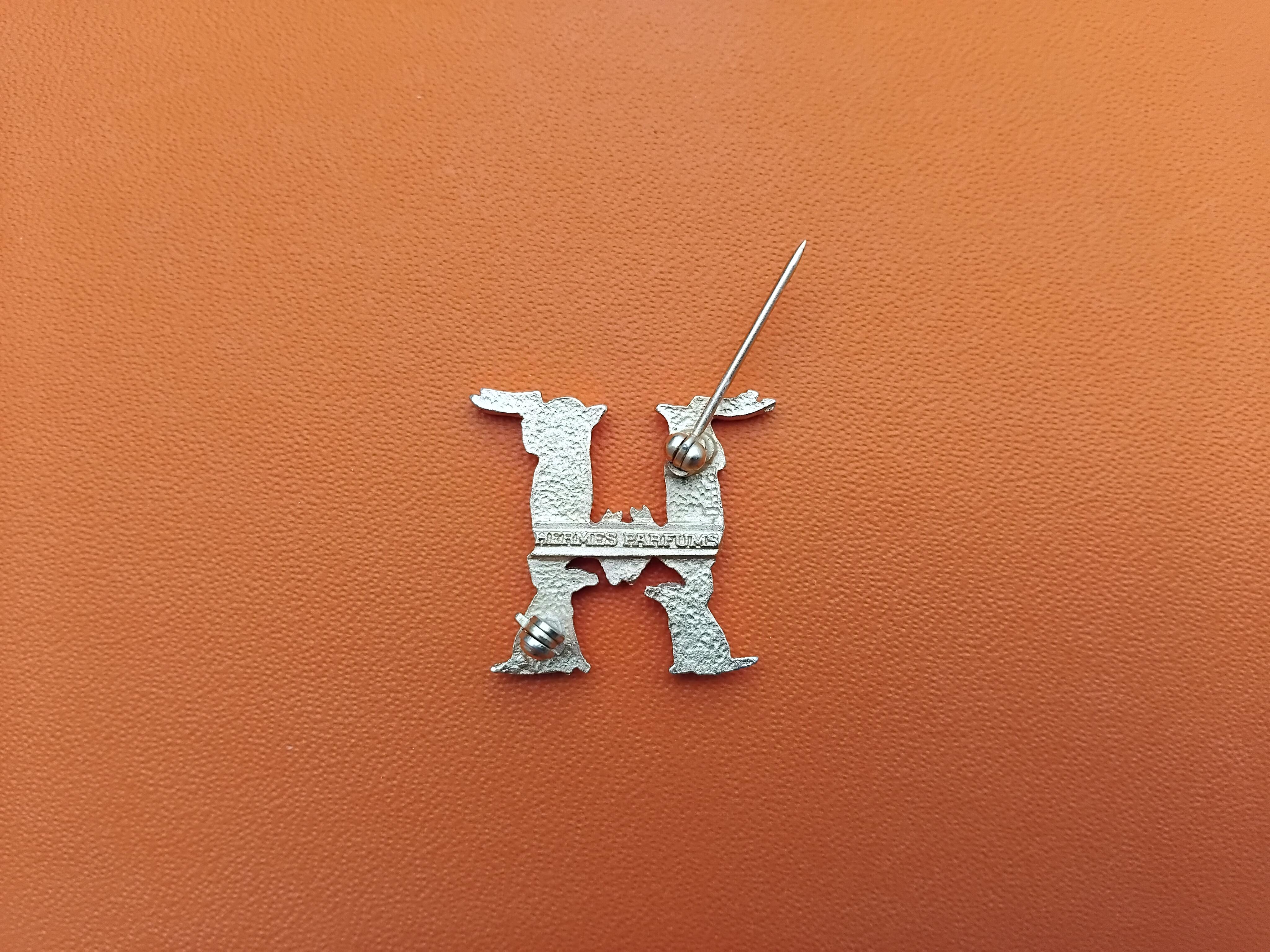 Hermès Golden Metal Brooch Does and Dogs Forming an H Alphabet III For Sale 1