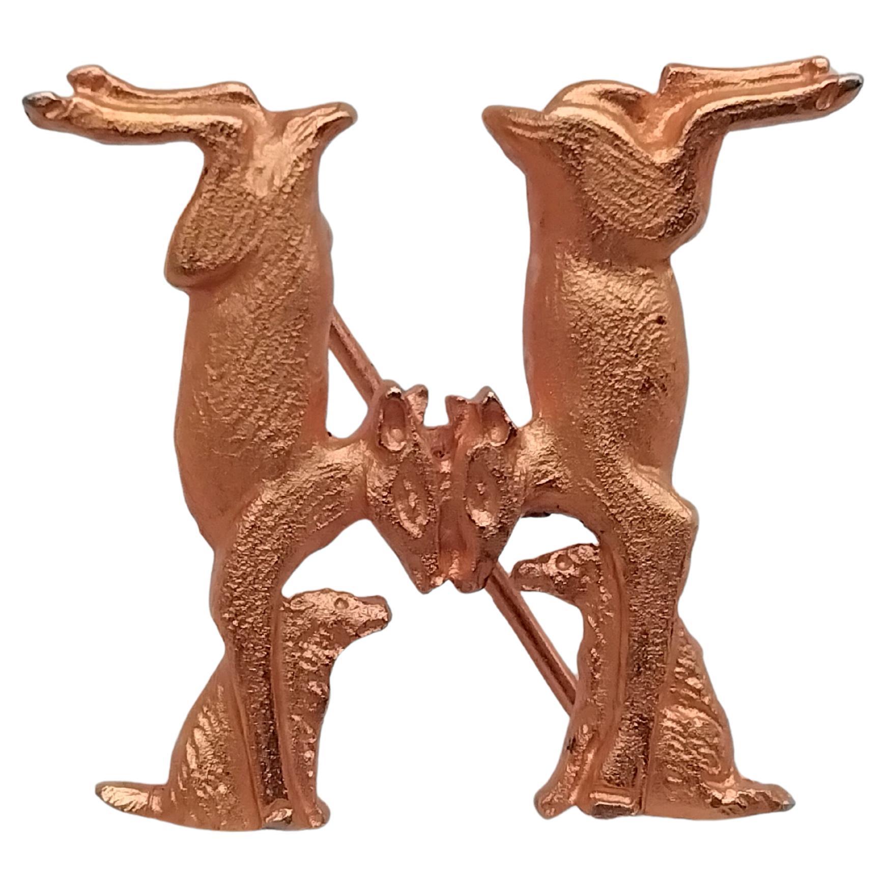 Hermès Golden Metal Brooch Does and Dogs Forming an H Alphabet III For Sale