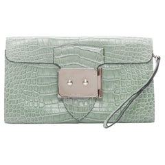 HERMES Goodlock Porosus mint green scaled leather PHW push clasp wrist clutch