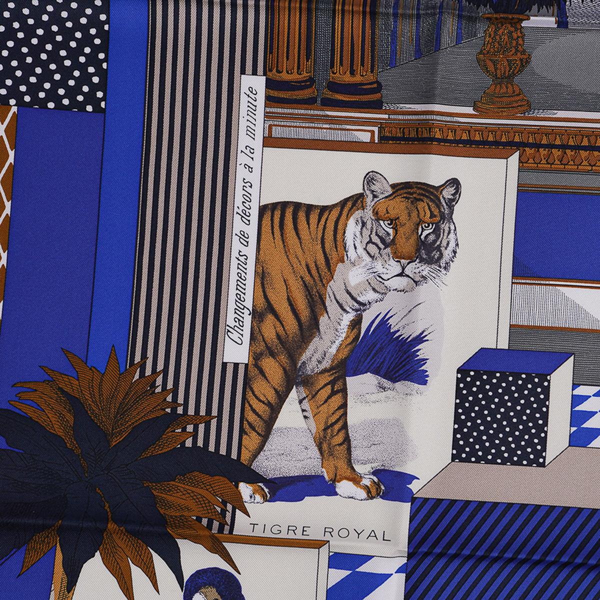 Mightychic offers an Hermes Grand Theatre Nouveau scarf featured in  Bleu Royal, Mordore and Blanc.
This exquisite scarf is a must have for any Hermes collector.
This fabulous print is designed by Gianpaolo Pagni and is a play on Epinal imagery