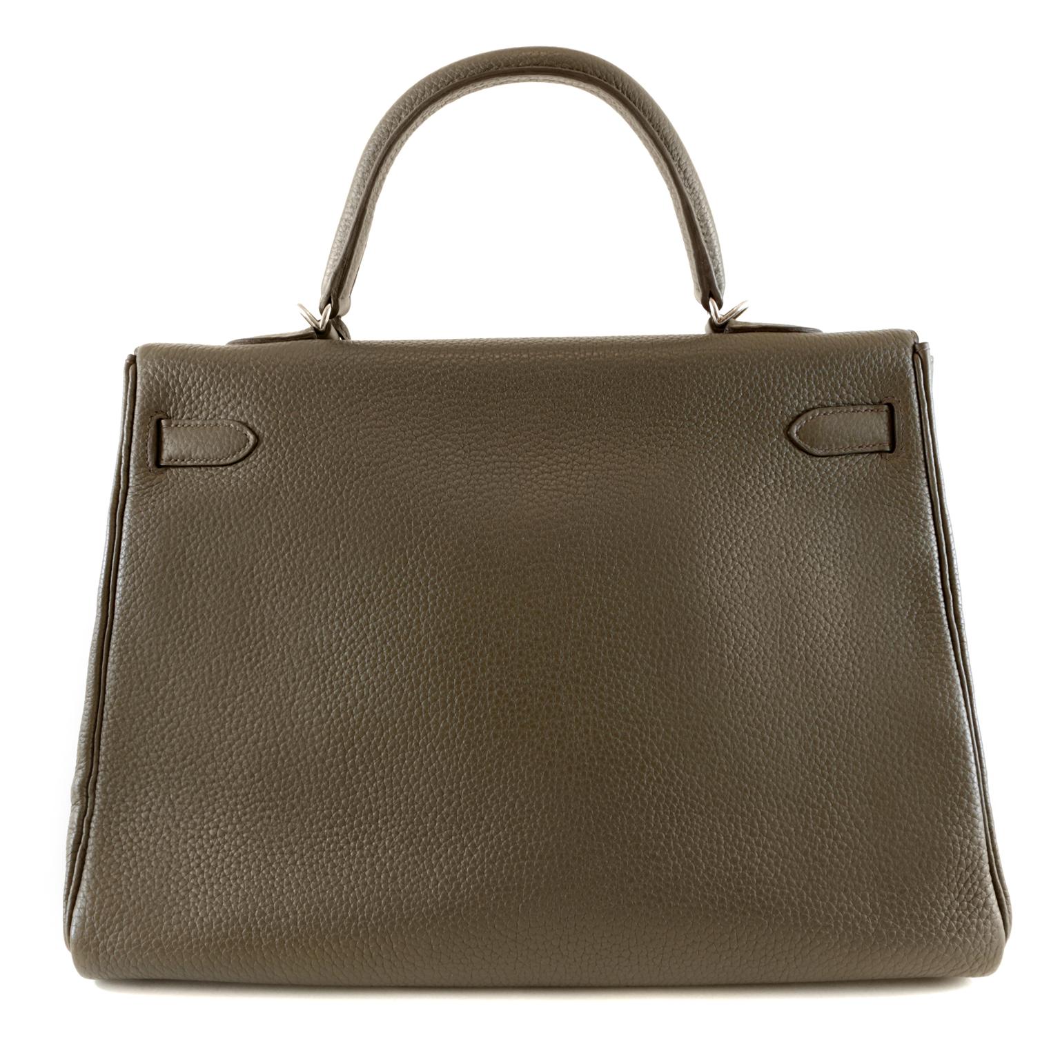 Hermès Graphite Clemence 35 cm  Kelly - MINT condition
 Hermès bags are considered the ultimate luxury item worldwide.  Each piece is handcrafted with waitlists that can exceed a year or more.  Graphite is a highly desirable neutral  that combines
