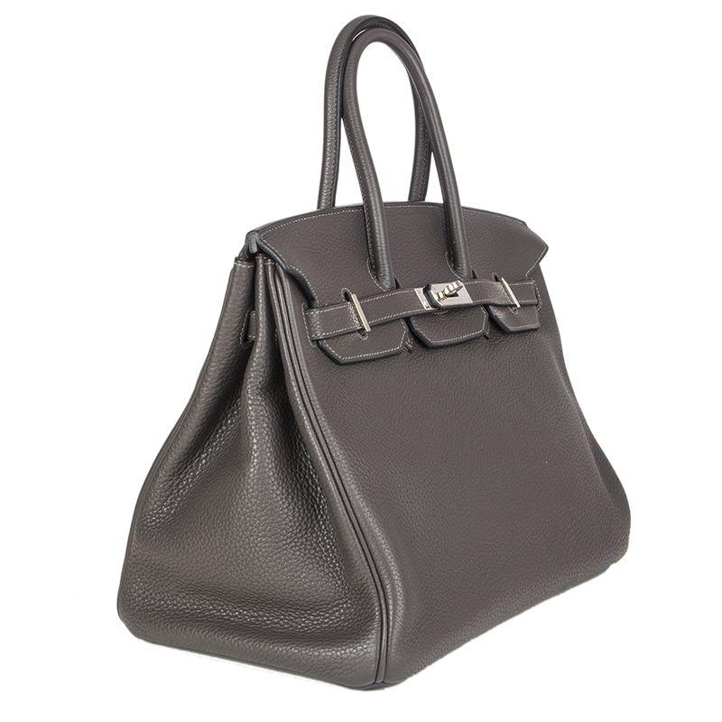 Hermes 'Birkin 35' in Graphite (dark grey) Taurillon Clemence leather. Lined in Chevre (goat skin) with an open pocket against the front and a zipper pocket against the back. Has been carried and is in excellent condition. Comes with keys, lock,