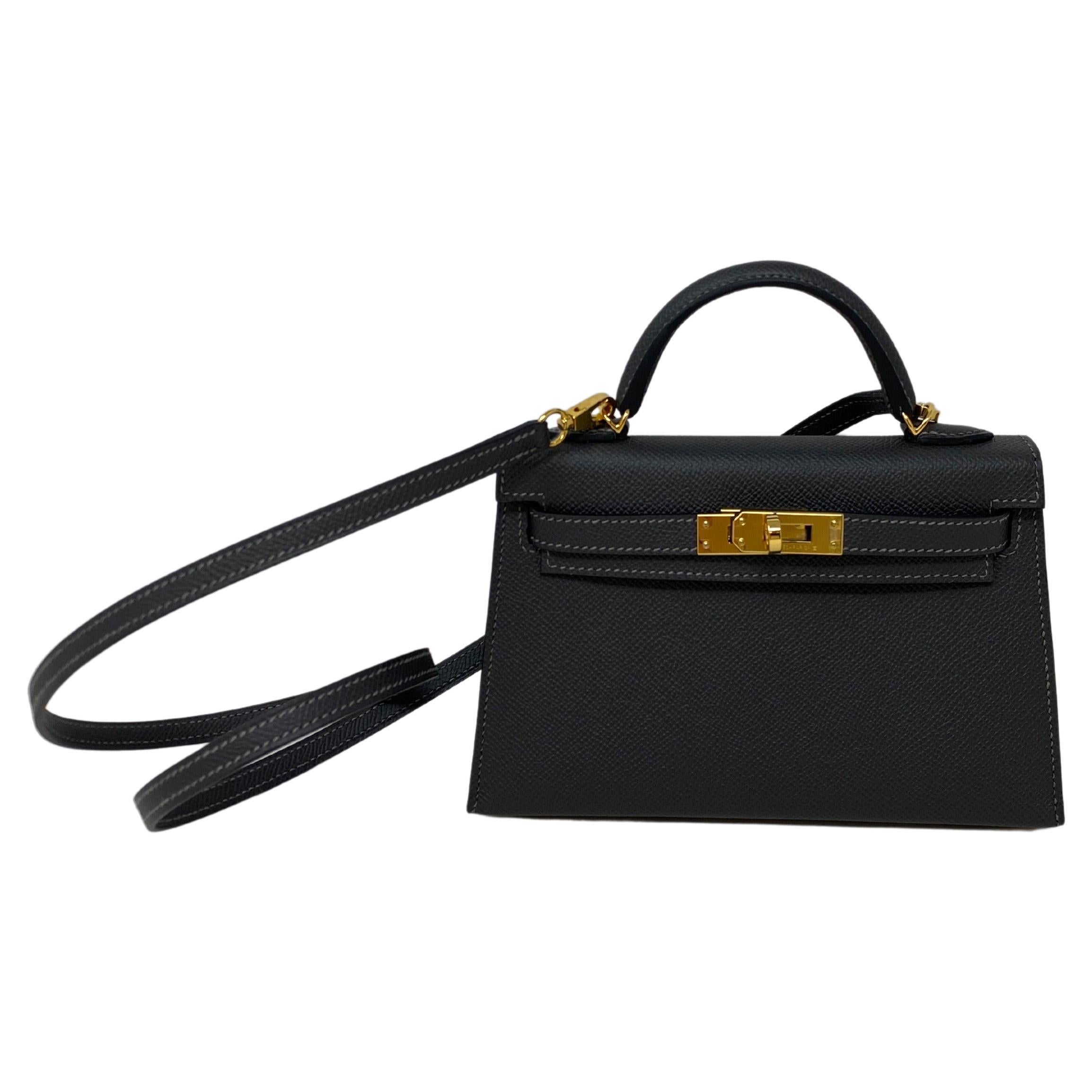 Hermes Graphite Mini Kelly Bag. Brand new mini Kelly. Gorgeous dark grey color. Very nice neutral color. Looks almost black. Gold hardware. The most wanted and rare mini size. The unicorn for Hermes right now. Such a rare piece do not miss out. Full