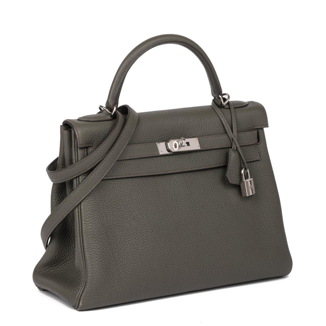 HERMÈS
Graphite Togo Leather Kelly 28cm Retourne

Xupes Reference: CB846
Serial Number: [P]
Age (Circa): 2012
Accompanied By: Lock, Keys, Clochette, Shoulder Strap
Authenticity Details: Date Stamp (Made in France)
Gender: Ladies
Type: Top Handle,