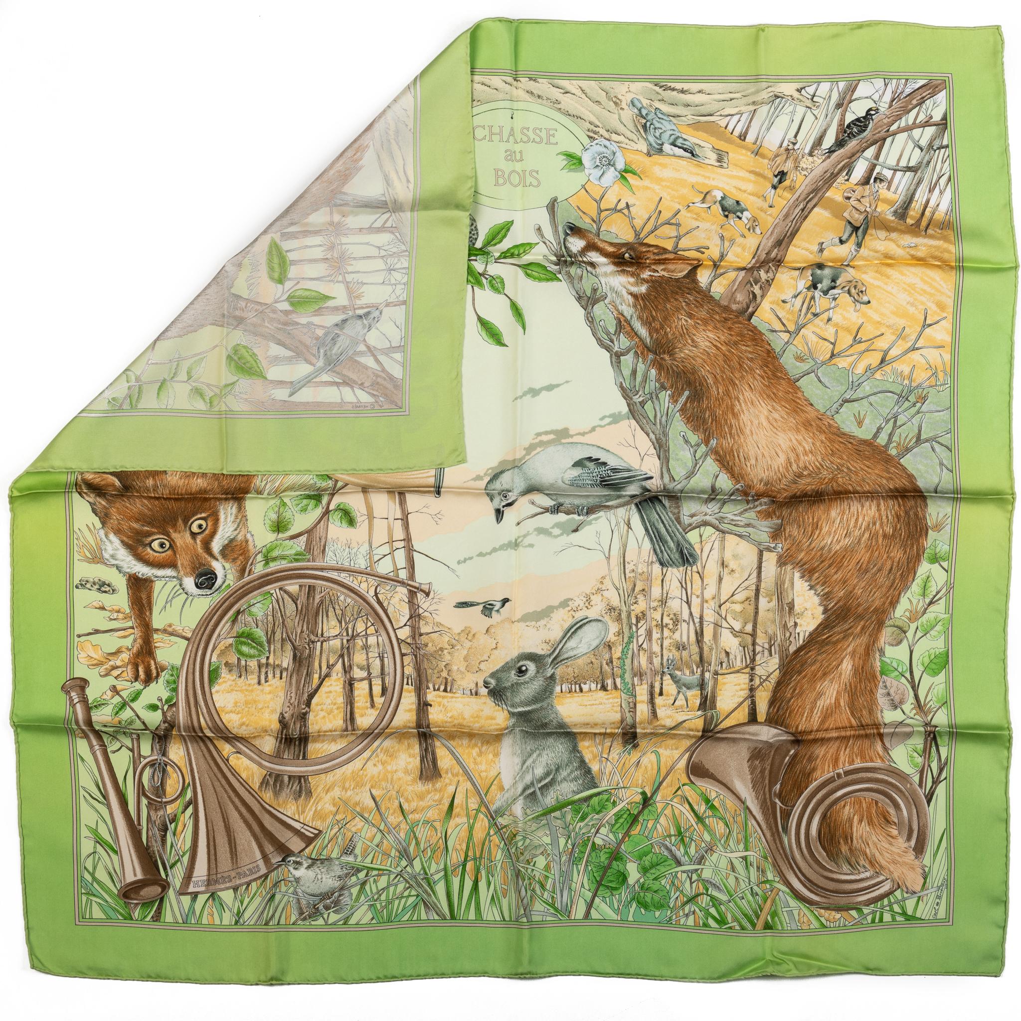 Hermes collectible Chasse au bois silk scarf in green and brown. Hand rolled edges. No box included.