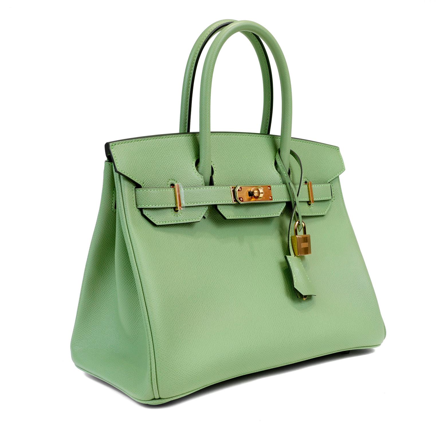 This authentic Hermès Green Cricket Epsom 30 cm Birkin is in pristine unworn condition; the protective plastic is still intact on the hardware.    Considered the ultimate luxury item, the Hermès Birkin is stitched by hand. Waitlists are commonplace
