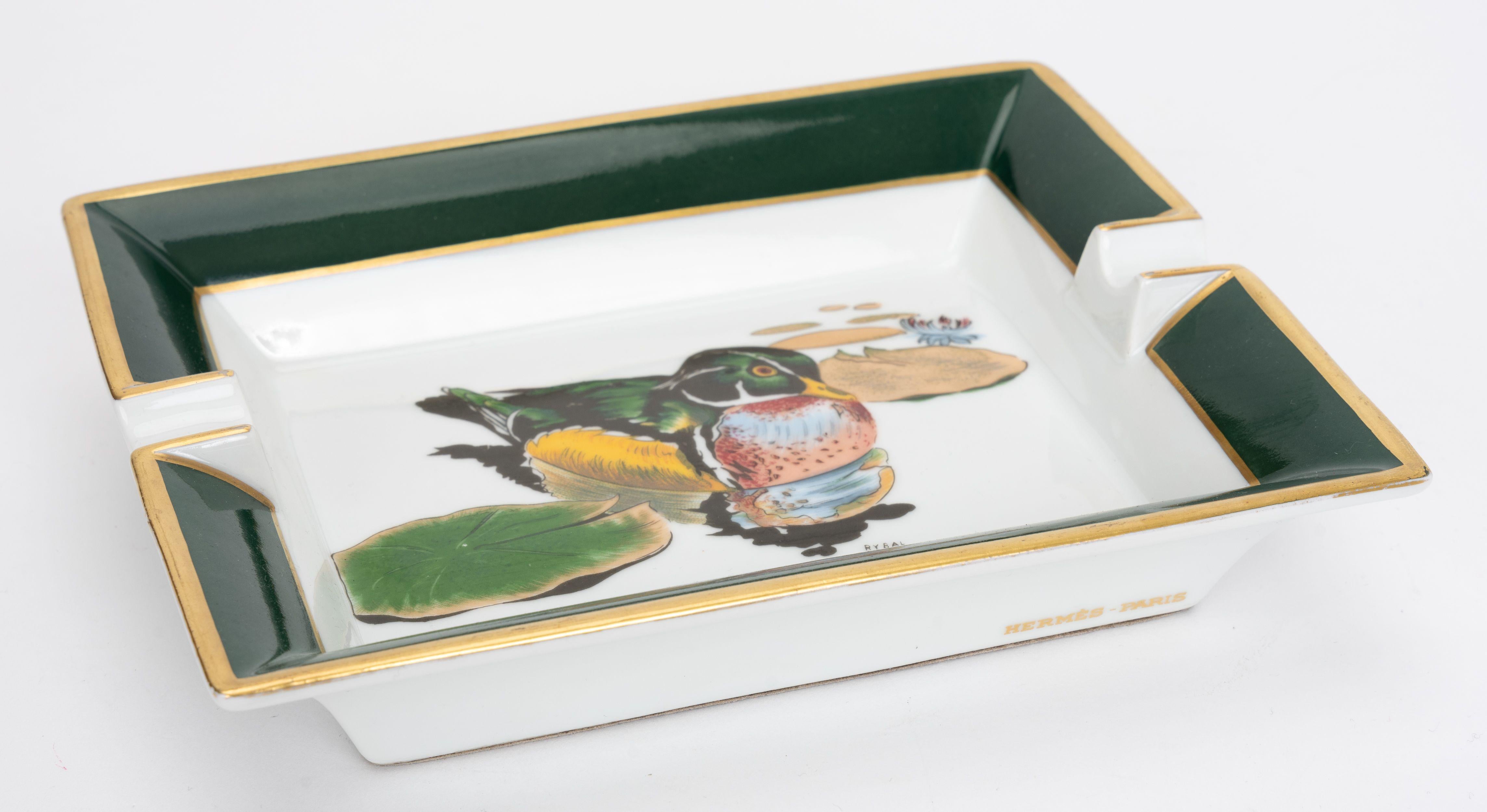 Hermès collectible green and white porcelain ashtray with duck design. Back protective suede with minor wear.