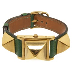 Grüne vergoldete Medor-Uhr aus Leder mit Quarz 23m von Hermès