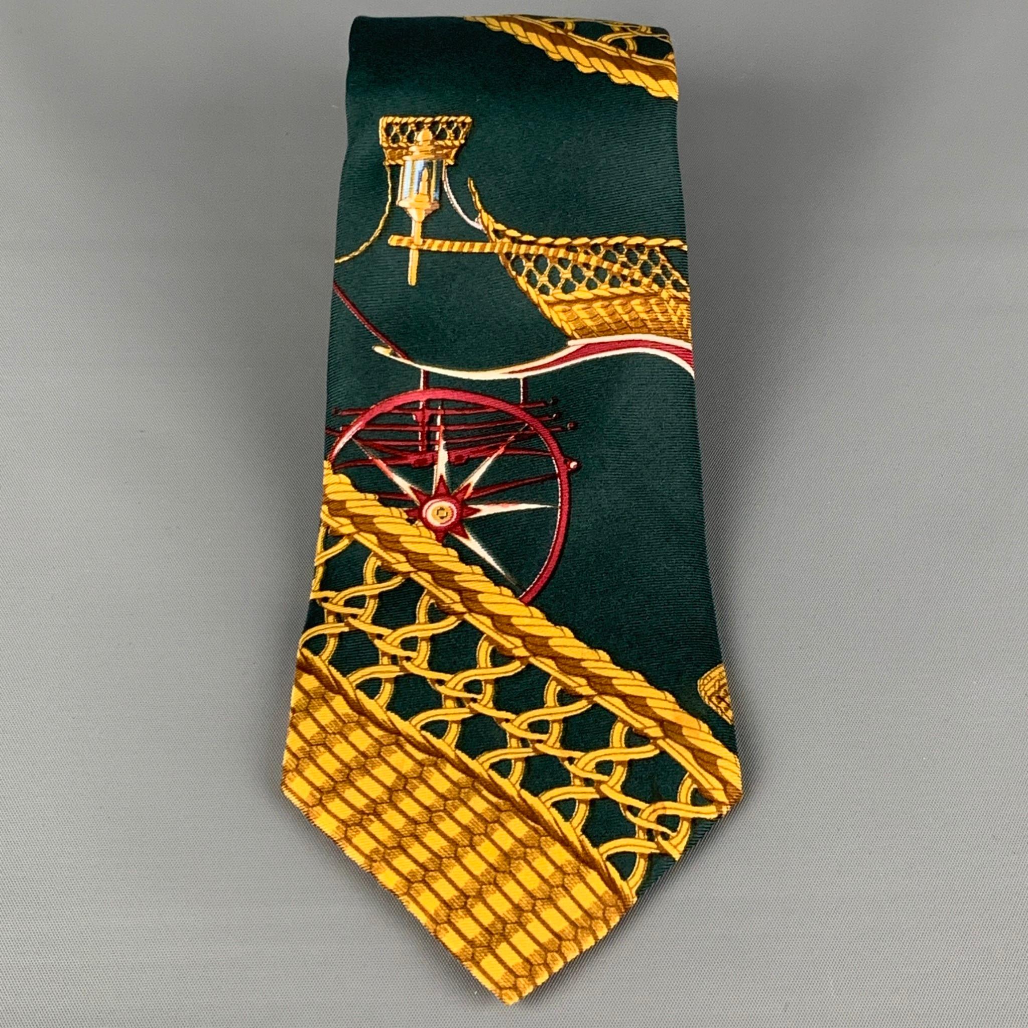 HERMES neck tie comes in a green & gold print silk. Made in France. 

Very Good Pre-Owned Condition.

Measurements:

Width: 3.5 in. 