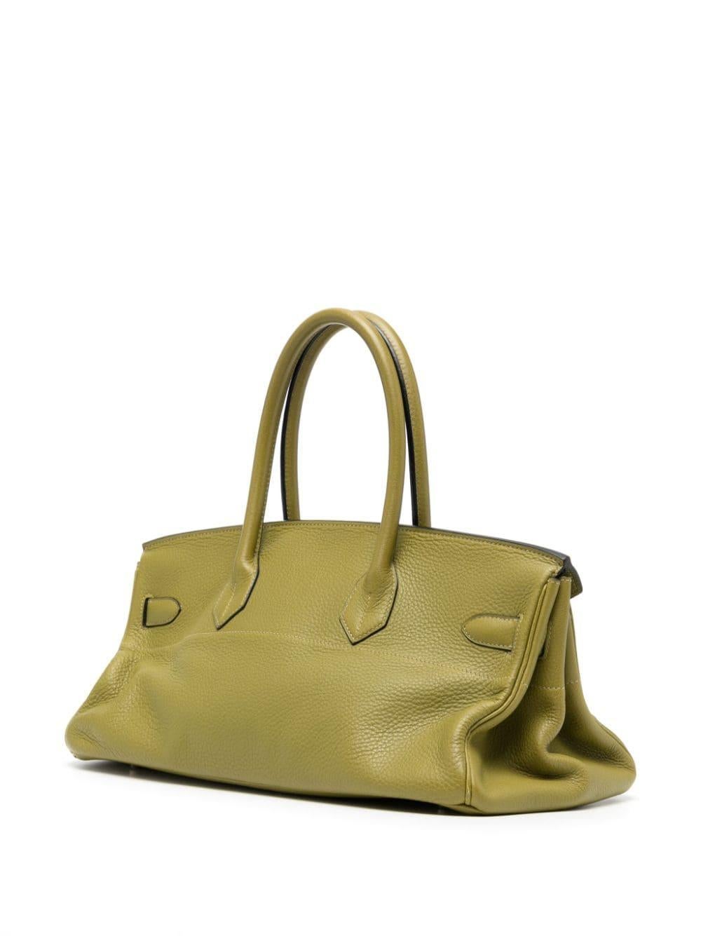 Ce sac Birkin de 42 cm conçu par Jean Paul Gaultier est une pièce unique. Pendant son mandat de directeur de la création chez Hermès, de 2003 à 2010, JPG a réimaginé certains des classiques bien-aimés d'Hermès, qui sont aujourd'hui devenus des