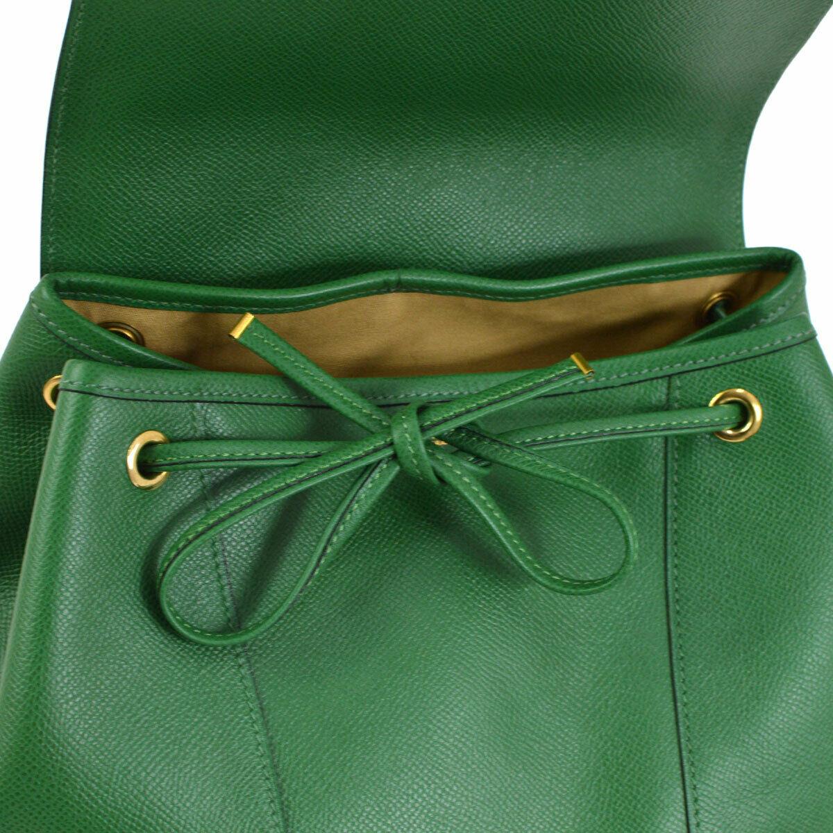 green leather backpack purse