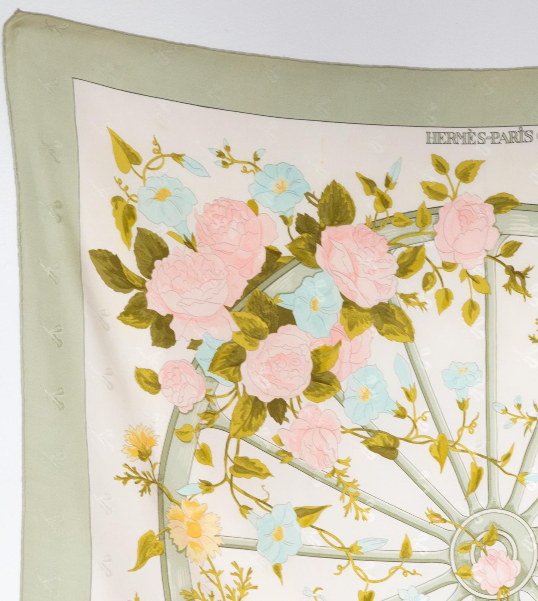 Hermes green silk scarf Romantique by Maurice Tranchant featuring a mandoline jacquard ground, a flower pattern and a top logo signature. 
Circa 1990s 
In good vintage condition. Made in France.
35,4in. (90cm)  X 35,4in. (90cm)
We guarantee you will