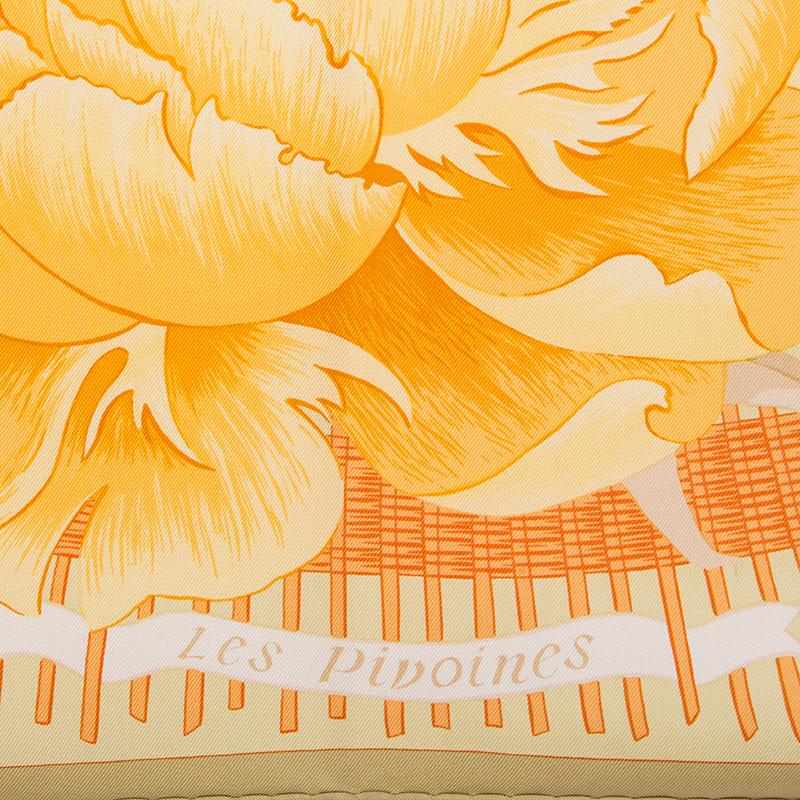 Hermes 'Pivoines 90' scarf by Christiane Vauzelles in pale green silk twill (100%) with khaki green border and details in shades of yellow and orange. Has been worn and is in excellent condition.

Width 90cm (35.1in)
Height 90cm (35.1in)