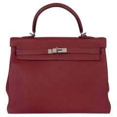 HERMES Grenat rosso Clemence pelle KELLY 35 RETOURNE Borsa Phw