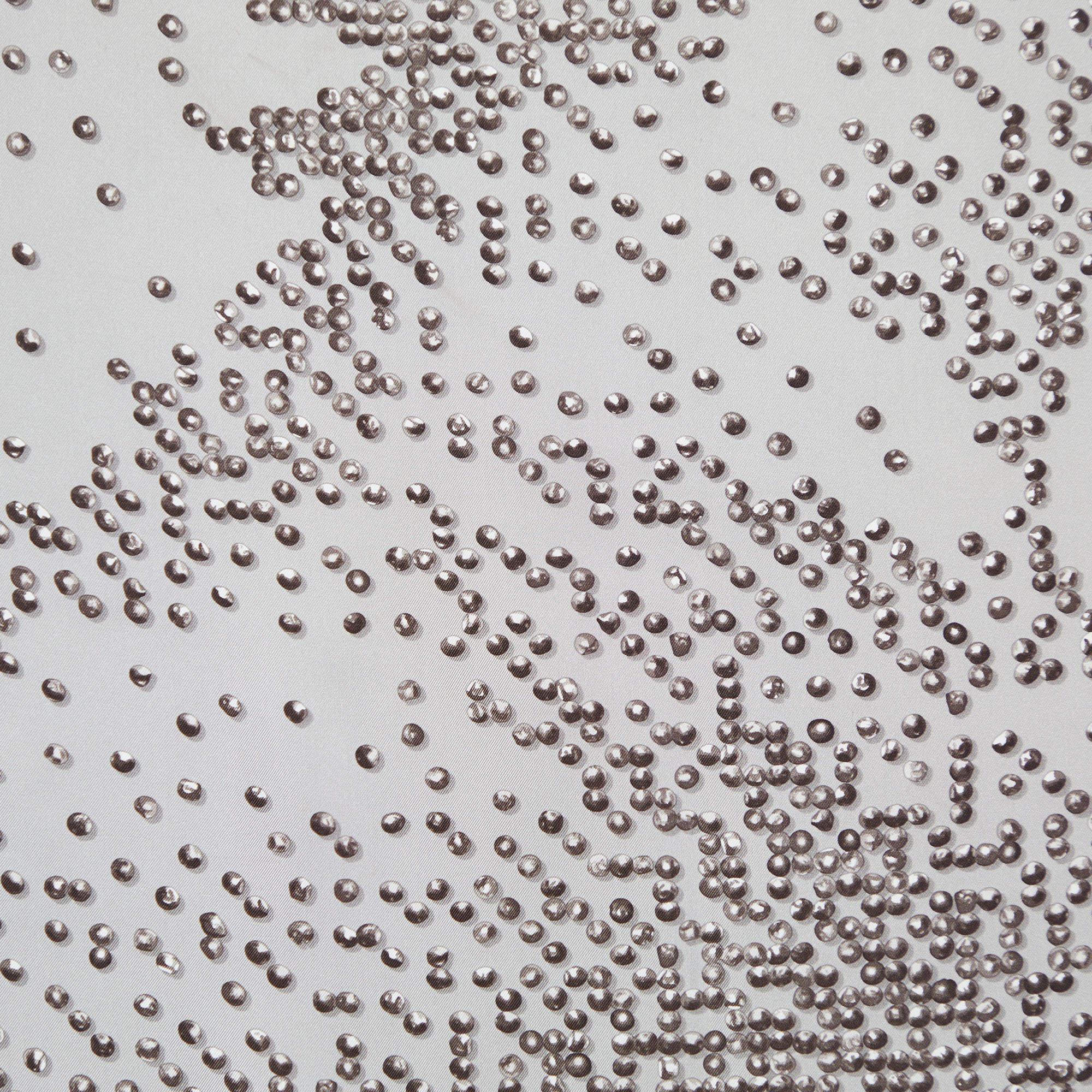 A prized buy for lovers of gorgeous scarves is this wonderful creation. This Hermès scarf, covered in prints and finished with hemmed edges, will change the way you accessorize. Go creative and start styling it with your bags or outfits.


