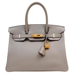 Hermès - Birkin 30 cm en cuir de chèvre gris avec accessoires en or