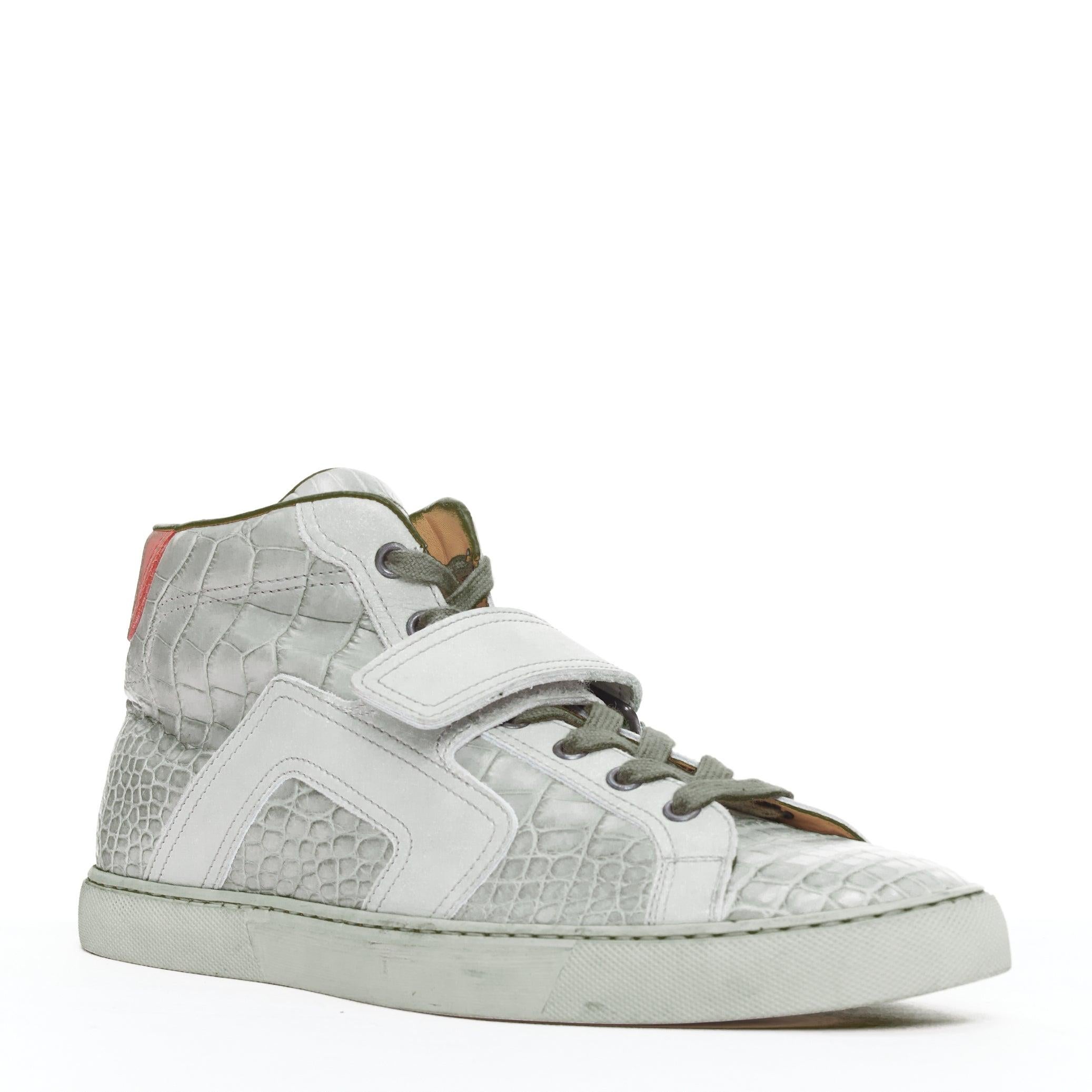 HERMES grey croc leather colorblock high top sneaker EU41.5 Kanye West
Reference: TGAS/E00498
Brand: Hermes
As seen on: Black seen on Kanye West
Material: Leather
Color: Grey, Red
Pattern: Animal Print
Closure: Lace Up
Lining: Nude Leather
Extra
