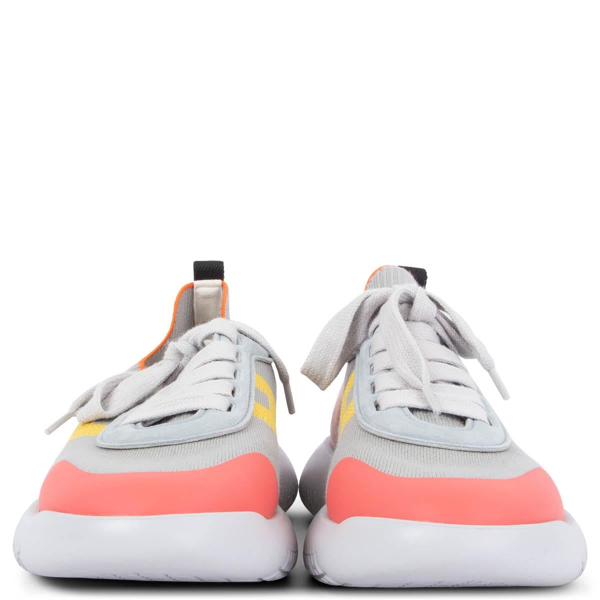 100% authentic Hermès Crew lace-up sock sneakers in grey and mulitcolor knit with pink suede heel and a coral tip. Grey rubber soles. Have been worn once and are in virtually new condition. Come with dust bag. 

Measurements
Imprinted Size	38
Shoe