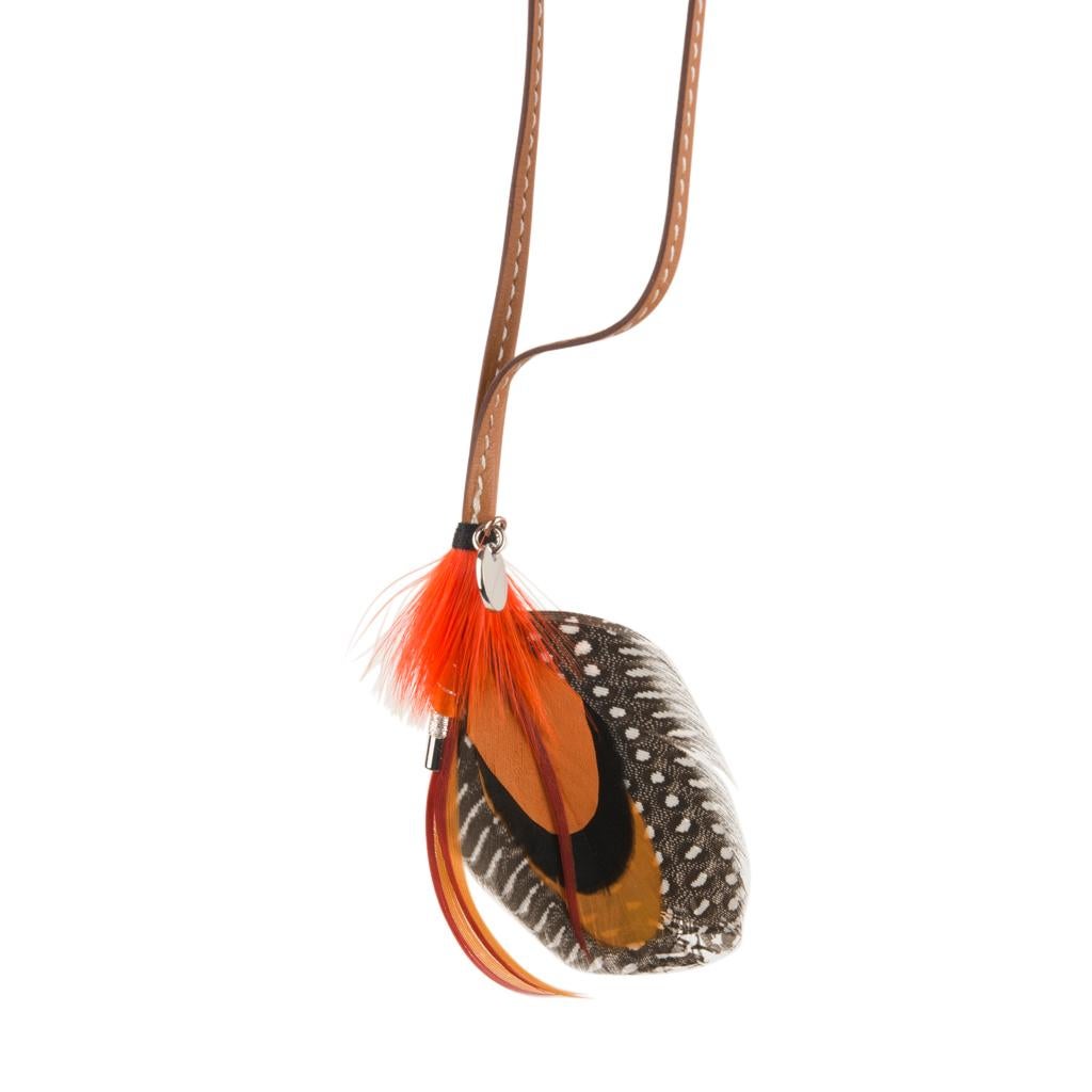 hermes feather charm