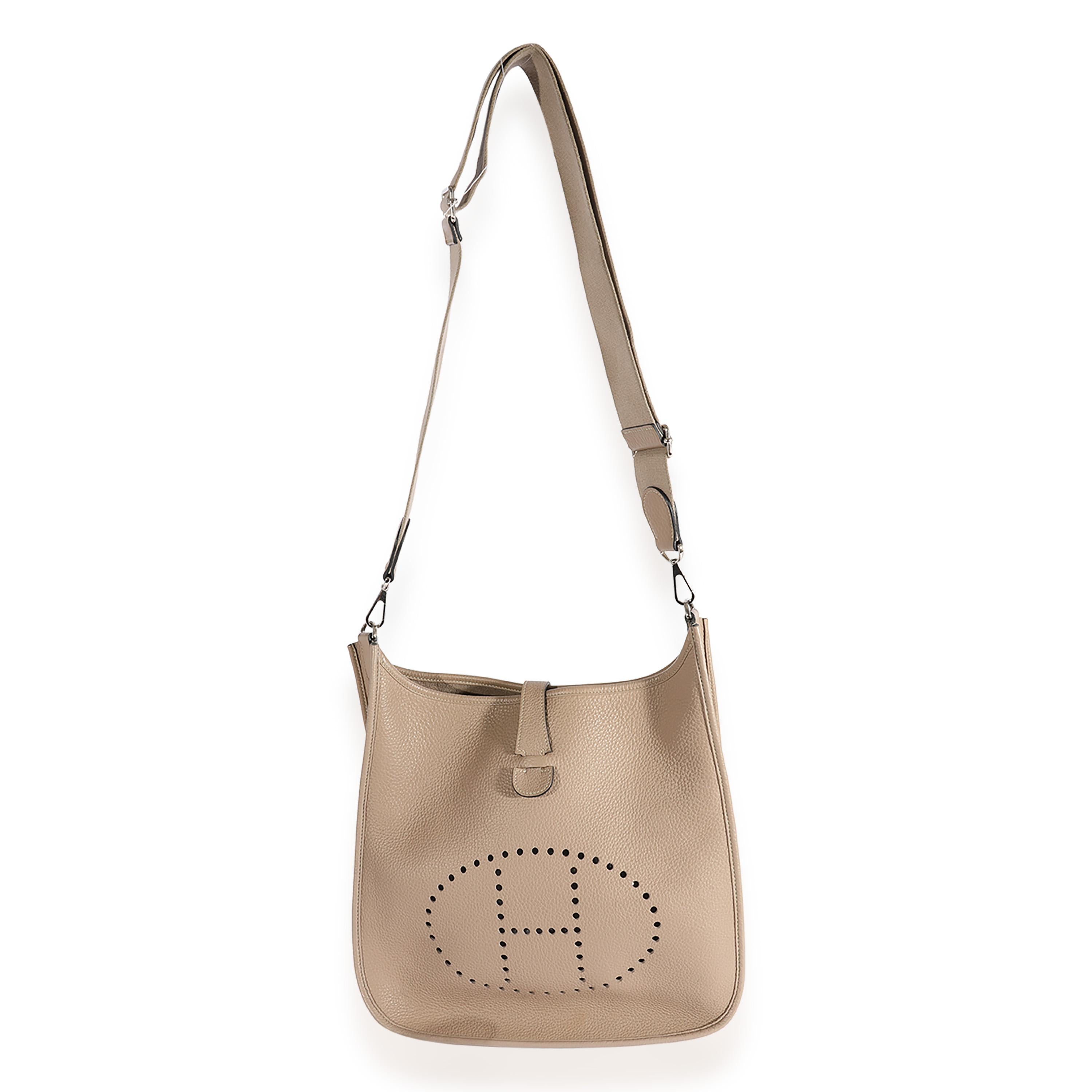 Listing Title: Hermès Gris Asphalte Clémence Evelyne III 33 PHW
SKU: 123521
Condition: Pre-owned 
Handbag Condition: Good
Condition Comments: Good Condition. Light scuffing to corners and exterior. Discoloration throughout leather. Scuffing to