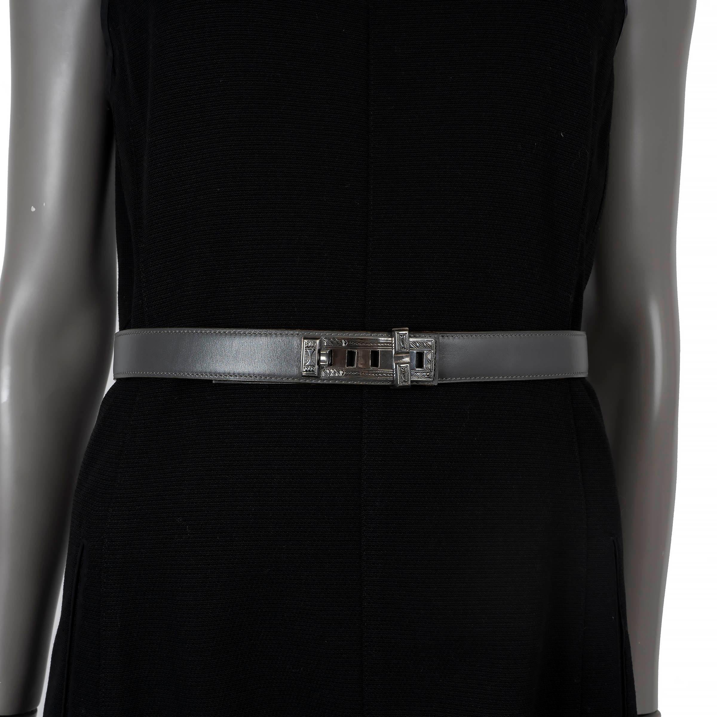 100% authentic Hermès Collier de Chien 24mm belt in Gris Fonce (dark grey) Box leather. Features a hand carved solid sterling silver buckle by Nigerian artist of the Touarg tribe. Has been worn and is in excellent condition. Comes with box.