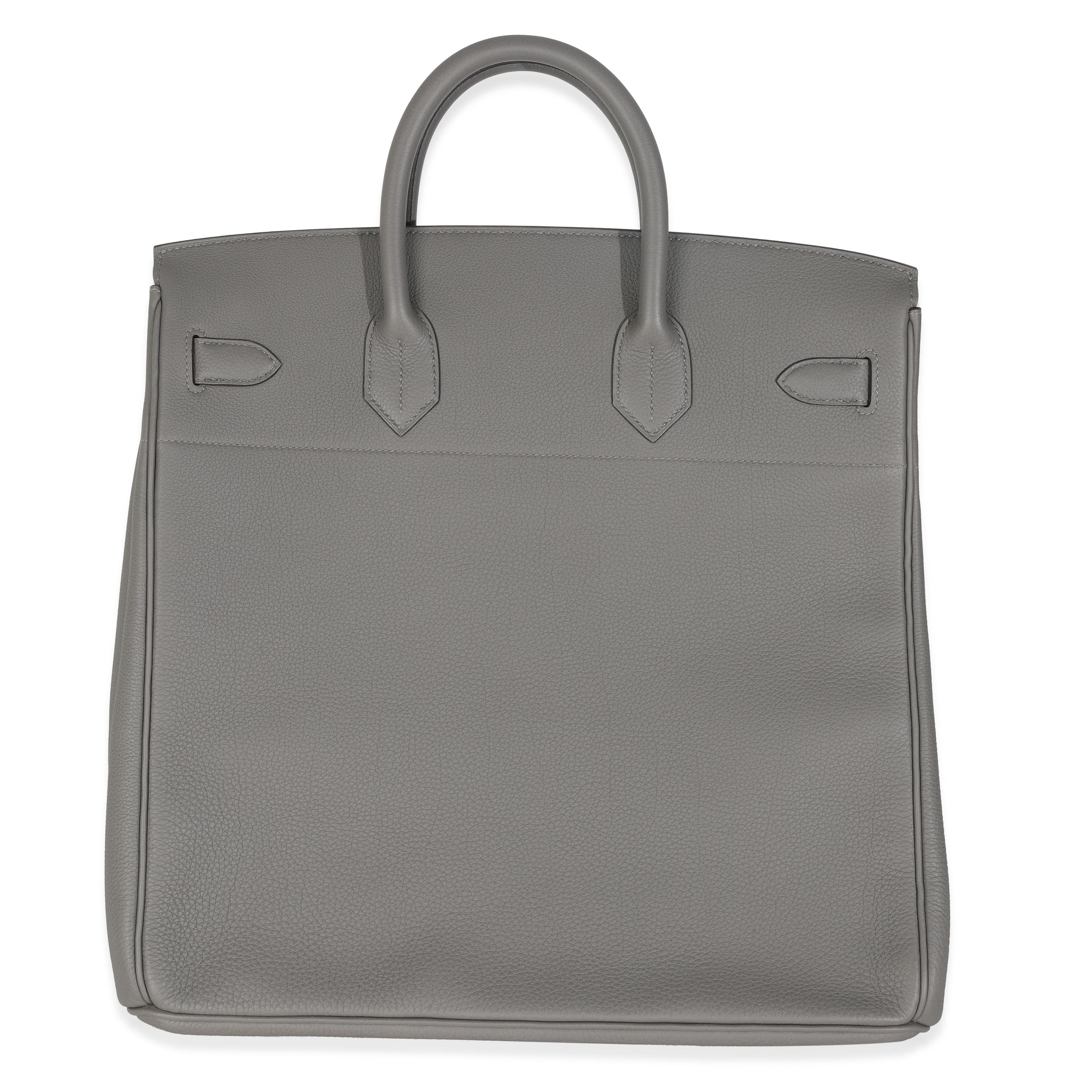Listing Title: Hermès Gris Meyer Togo Birkin HAC 40 PHW
SKU: M146808
Condition: Pre-owned 
Condition Description: The elusive Birkin bag from Hermès was designed after then-artistic director, Jean-Louis Dumas, was sat next to Jane Birkin on a flight